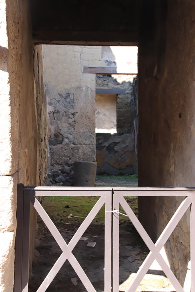 III 17, Herculaneum, October 2022. 
Looking west through entrance doorway. Photo courtesy of Klaus Heese.